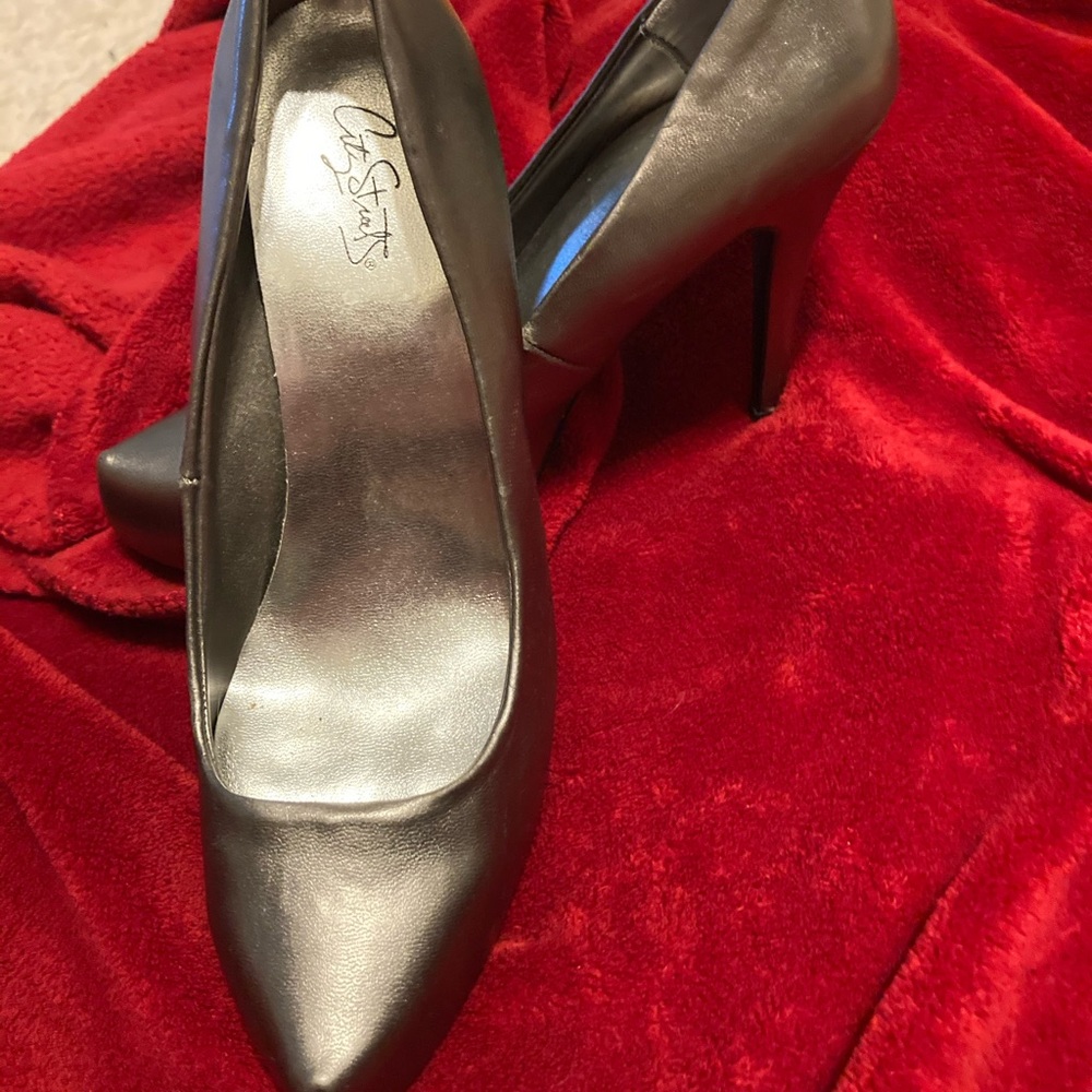 Pewter high heel shoes made by Citi Strat’s